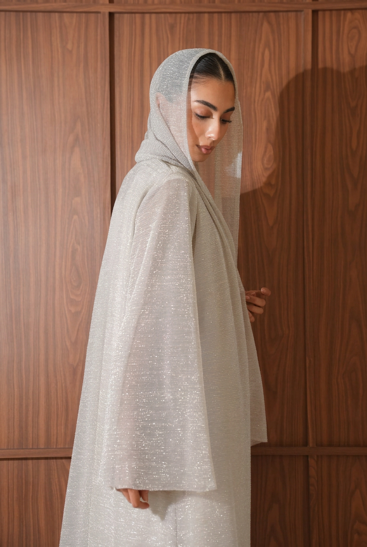Scarf retouch with a smoother, straighter top